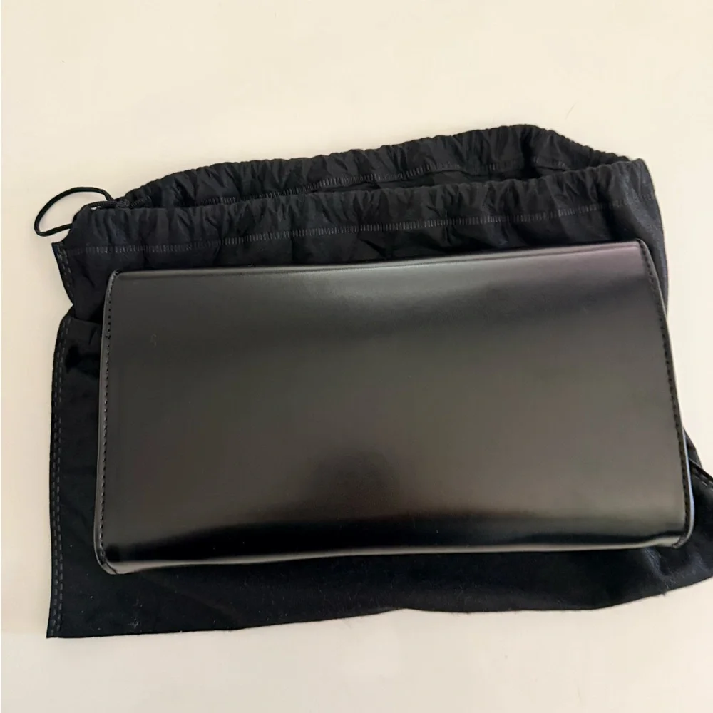 Badgley Mischka Elegant Black Clutch with Silver Accent